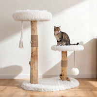 solid wood cat tree with multiple levels and comfortable resting platforms for indoor cats