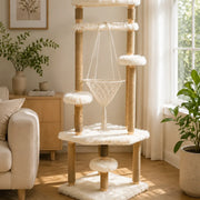 A_tall_solid_wood_cat_tree_placed_near_a_wall_and_window_with_open_landing_space