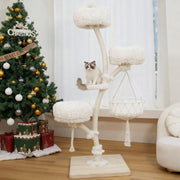 White solid wood cat tree with multiple cushioned platforms in a bright living room during the holiday season