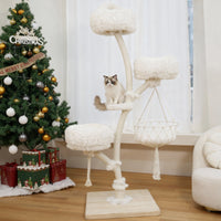 White solid wood cat tree with multiple cushioned platforms in a bright living room during the holiday season